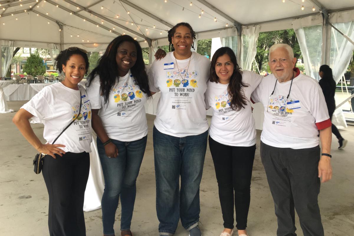 Calculated Genius Board Members pose for a photo at the organization's school supply drive. 